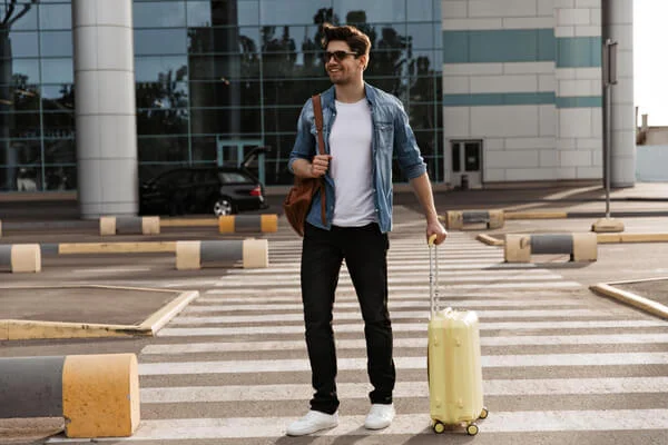 Man carrying light luggage